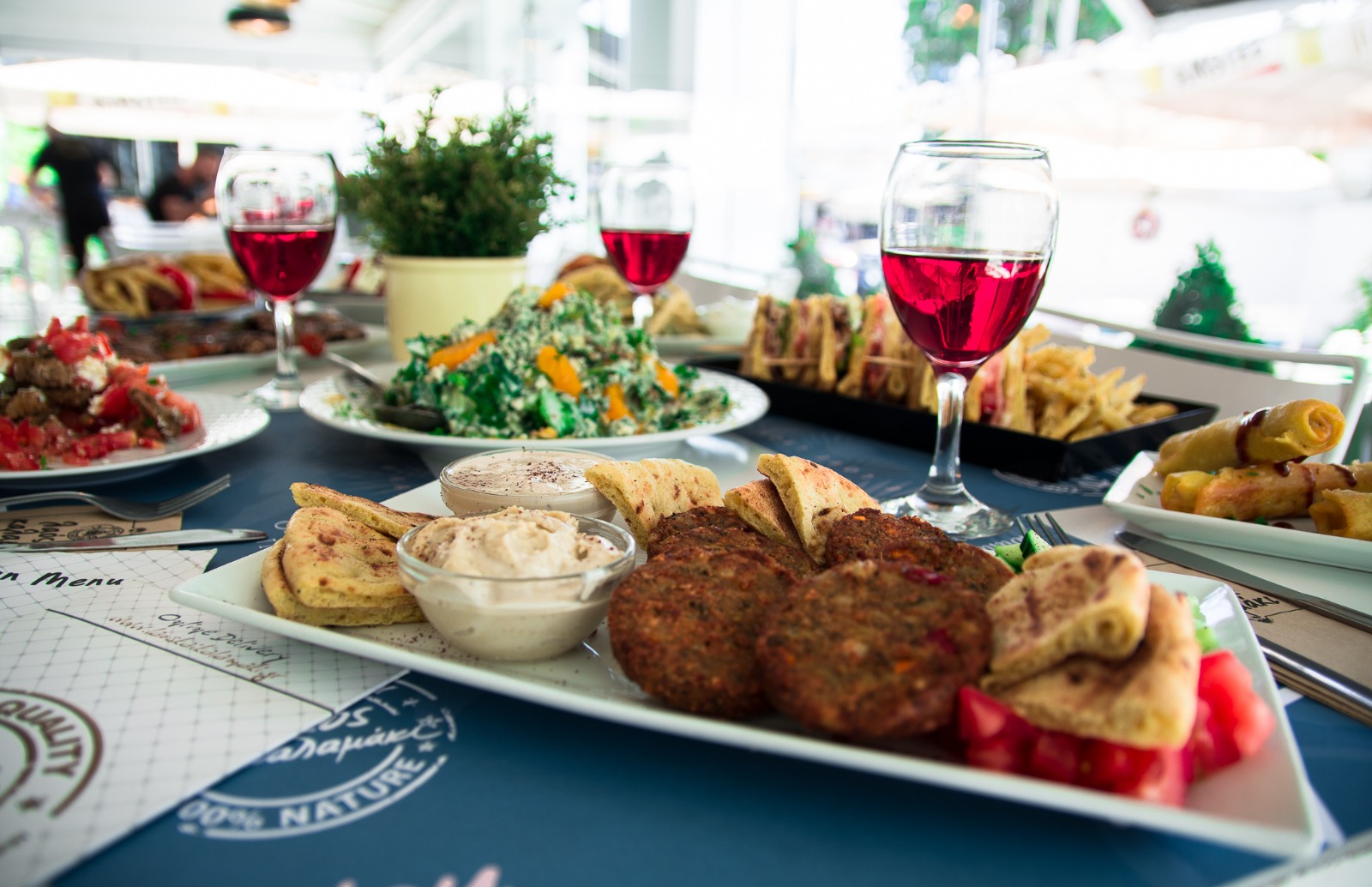laos kai kalamaki athens food meat burger tzatziki wine fries